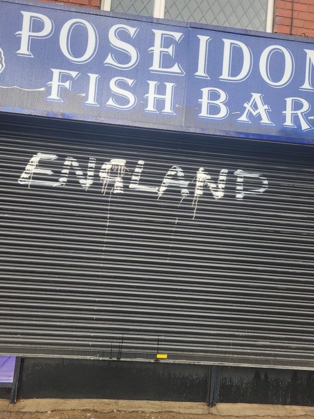 Darin Ahmed arrived to find 'England' spray painted in white over his business
