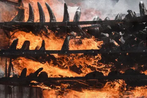 Getty Images Assam Government burnt rhino horns at a stadium near the Kaziranga National Park on September 22, 2021, in Bokakhat, Assam, India. The Assam government burned 2,467 horns primarily seized from illegal trade and stored in treasuries across the Assam state. The burning of rhino horns in Assam was conducted publicly to mark a milestone towards rhino conservation. (Photo by David Talukdar/NurPhoto via Getty Images)
