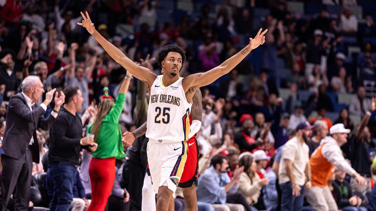 New Orleans Pelicans forward Trey Murphy III (25) reacts to making a three point basket against the Houston Rockets during the second half at Smoothie King Center.