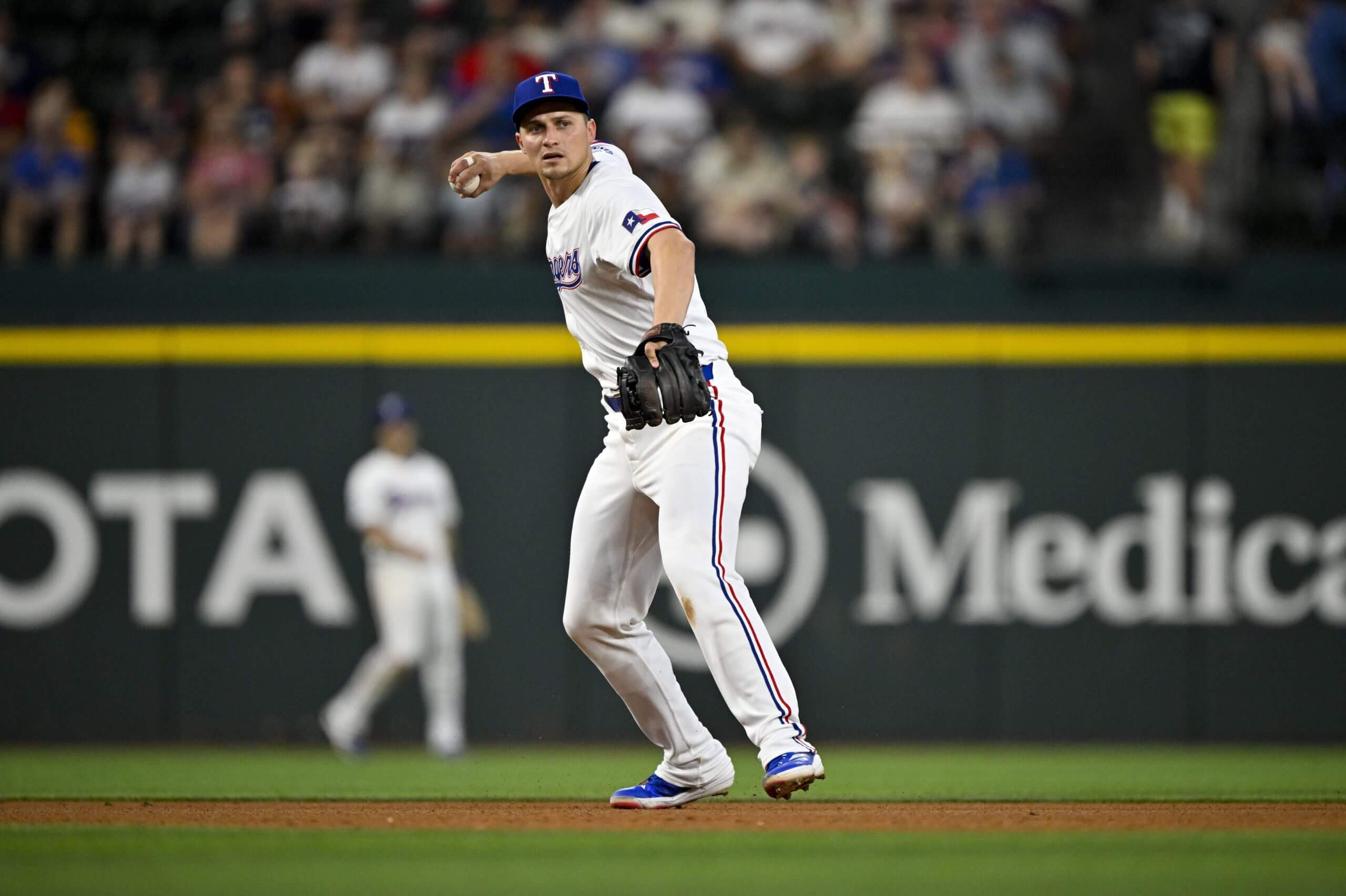 Aug 7, 2024; Arlington, Texas, USA; Texas Rangers shortstop Corey Seager (5) in action during the game between the Texas Rangers and the Houston Astros at Globe Life Field.
