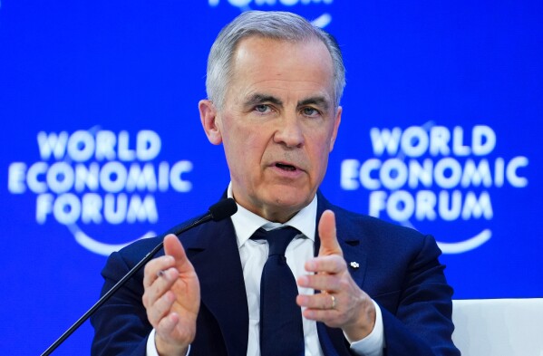 Canada Prime Minister Mark Carney delivers a speech at the World Economic Forum in Davos, Switzerland on Tuesday, Jan. 20, 2026. (Sean Kilpatrick/The Canadian Press via AP, File)