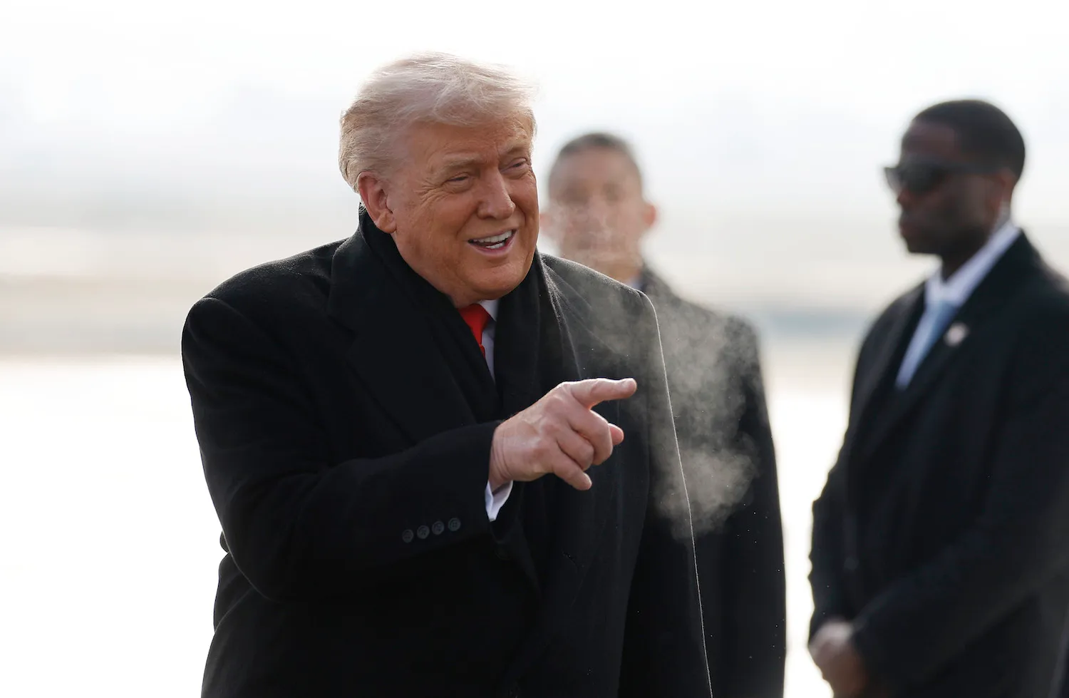 U.S. President Donald Trump disembarks Air Force One as he arrives at Zurich Airport in Zurich, Switzerland, before attending the World Economic Forum in Davos.