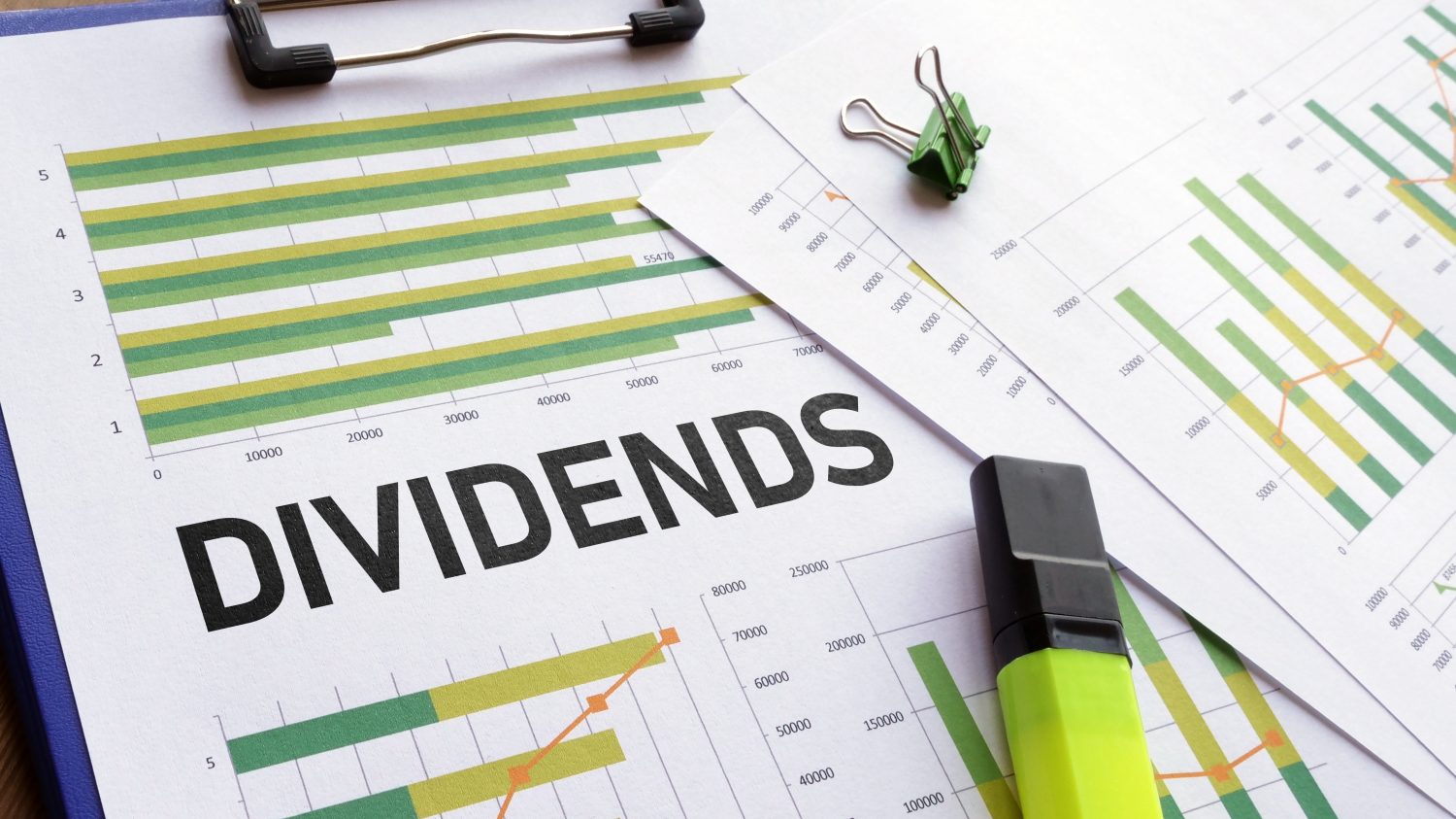 Dividends are shown with financial charts. Dividend investing