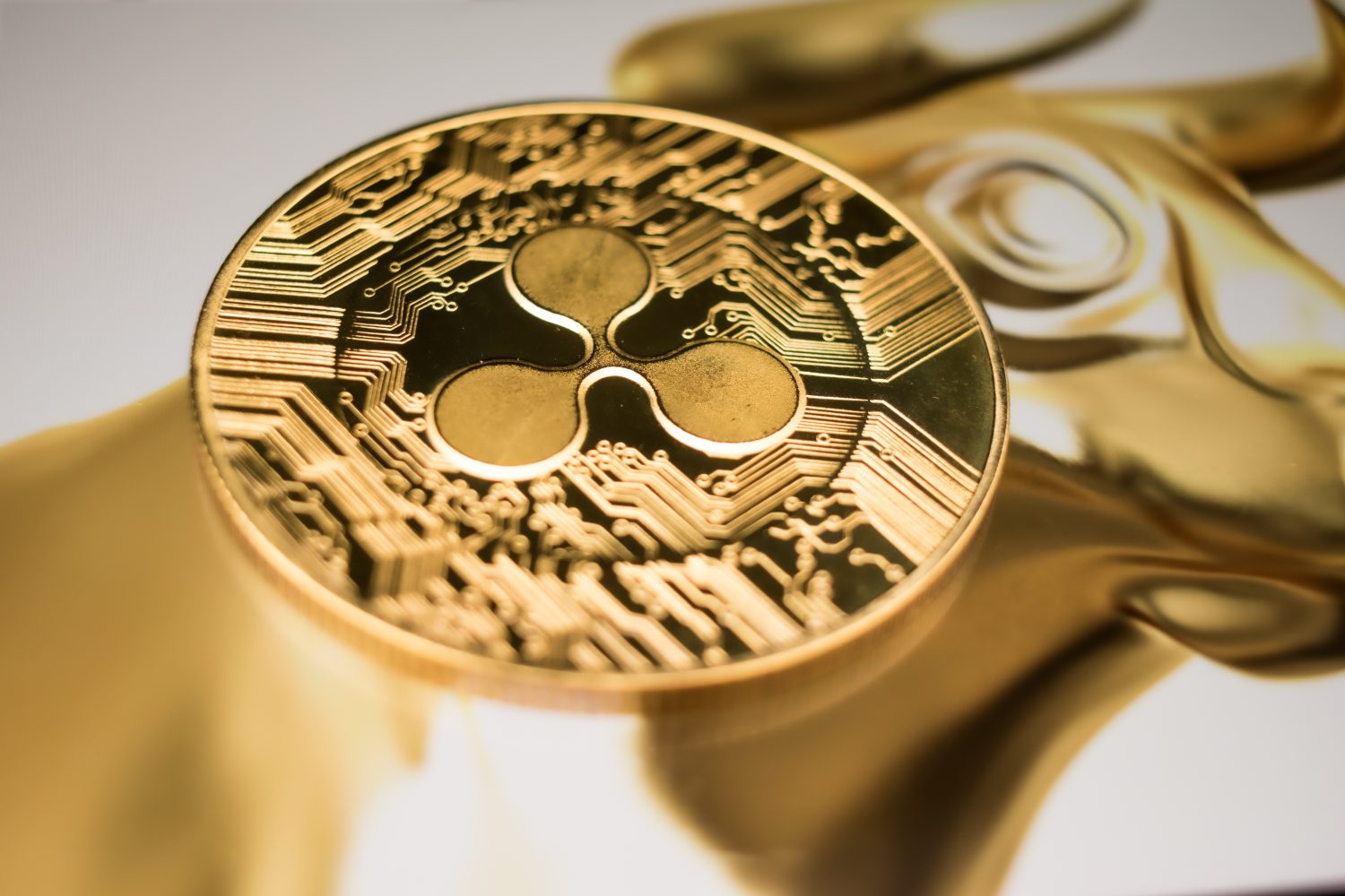 Golden Ripple XRP Coin on Futuristic Digital Technology Background