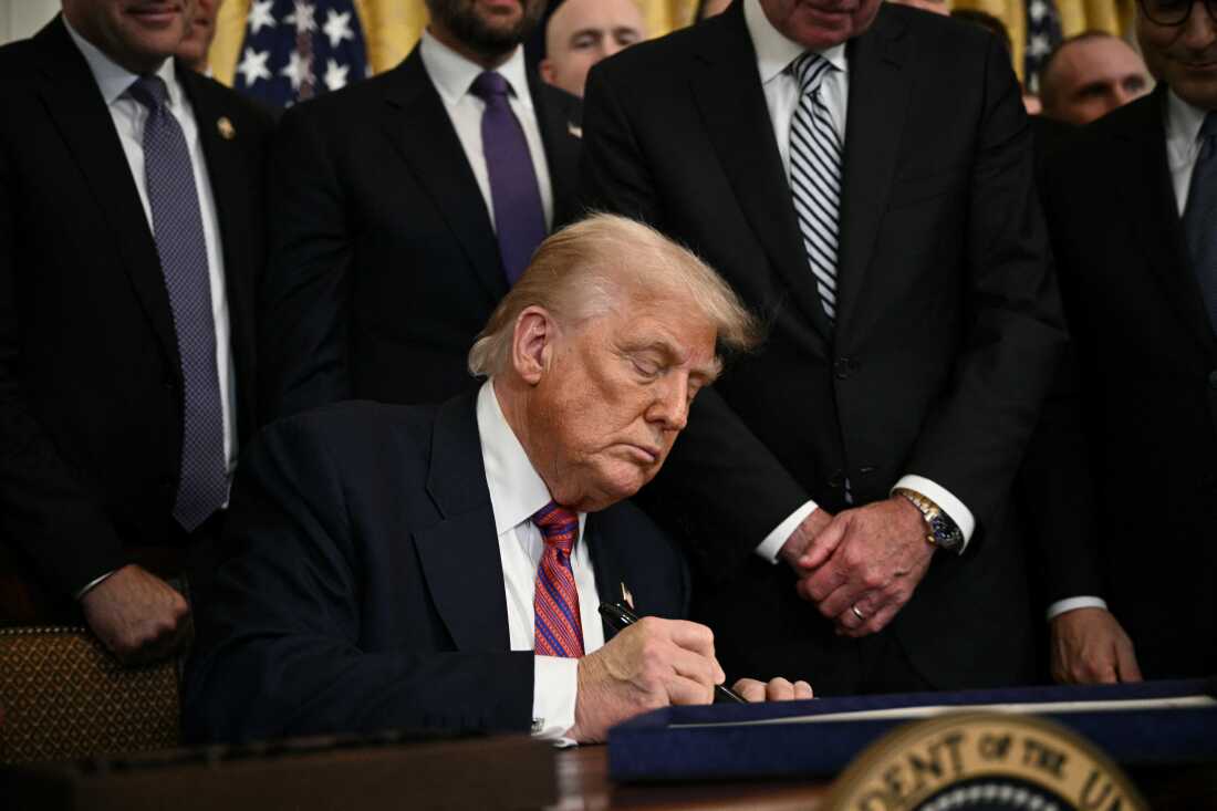 President Trump signs the GENIUS Act in the East Room of the White House in Washington, D.C., on July 18, 2025. The legislation marked a big win for the crypto sector.