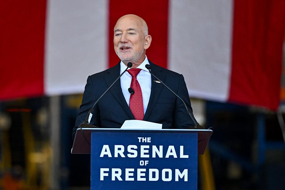 Blue Origin CEO Jeff Bezos speaks onstage ahead of US Defense Secretary Pete Hegseth at Blue Origin in Cape Canaveral, Florida, on February 2, 2026.  (Photo by Miguel J. Rodriguez Carrillo / AFP via Getty Images)