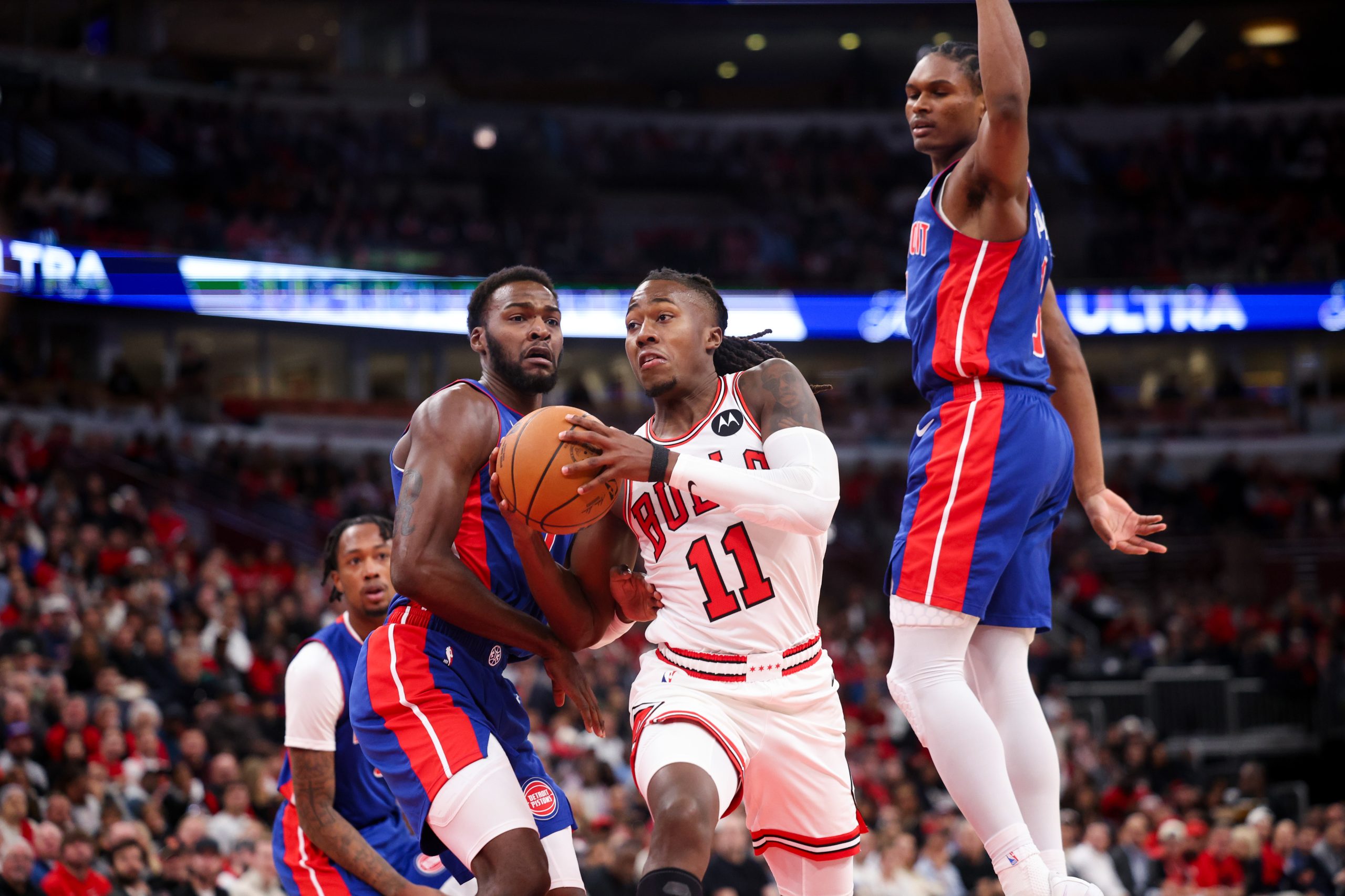 Chicago Bulls guard Ayo Dosunmu (11) drives to the basket...