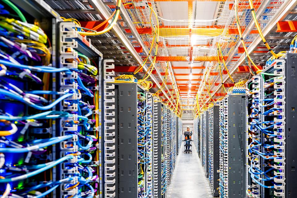 A technician works at an Amazon Web Services AI data center in New Carlisle, Indiana, U.S., October 2, 2025. REUTERS/Noah Berger for AWS