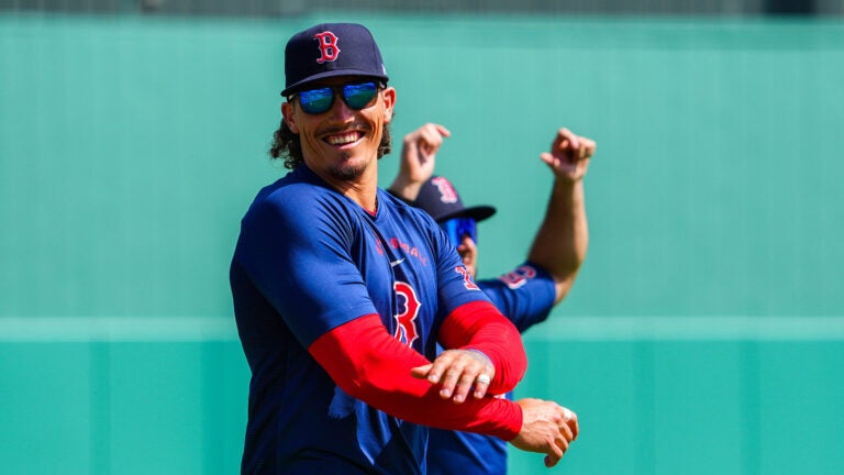 Boston Red Sox left fielder Jarren Duran (16) warming up before fielding drills. Day 7 of Boston Red Sox Spring Training at Jet Blue Park in Fort Myers, FL.